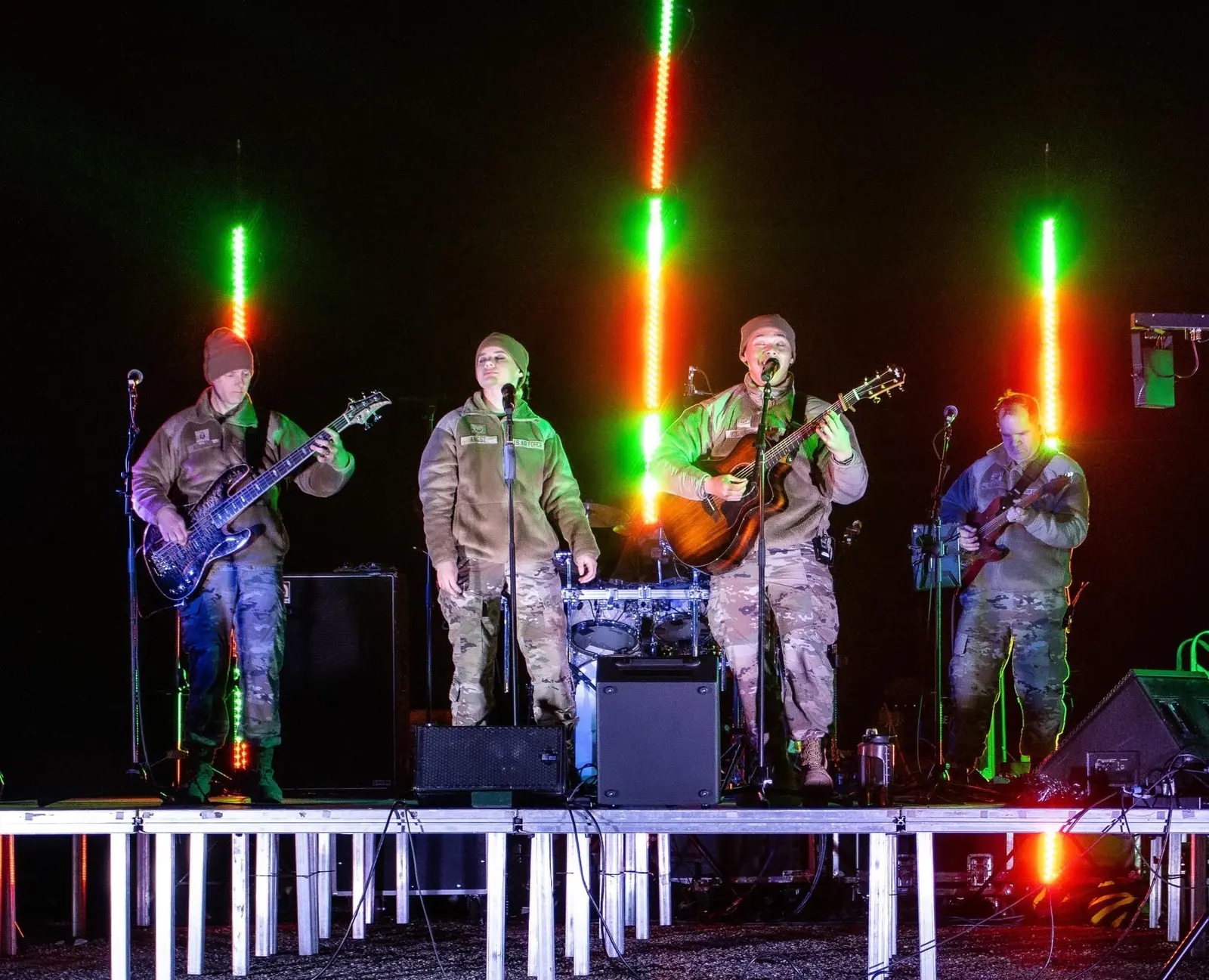 Live band performing under event lighting
