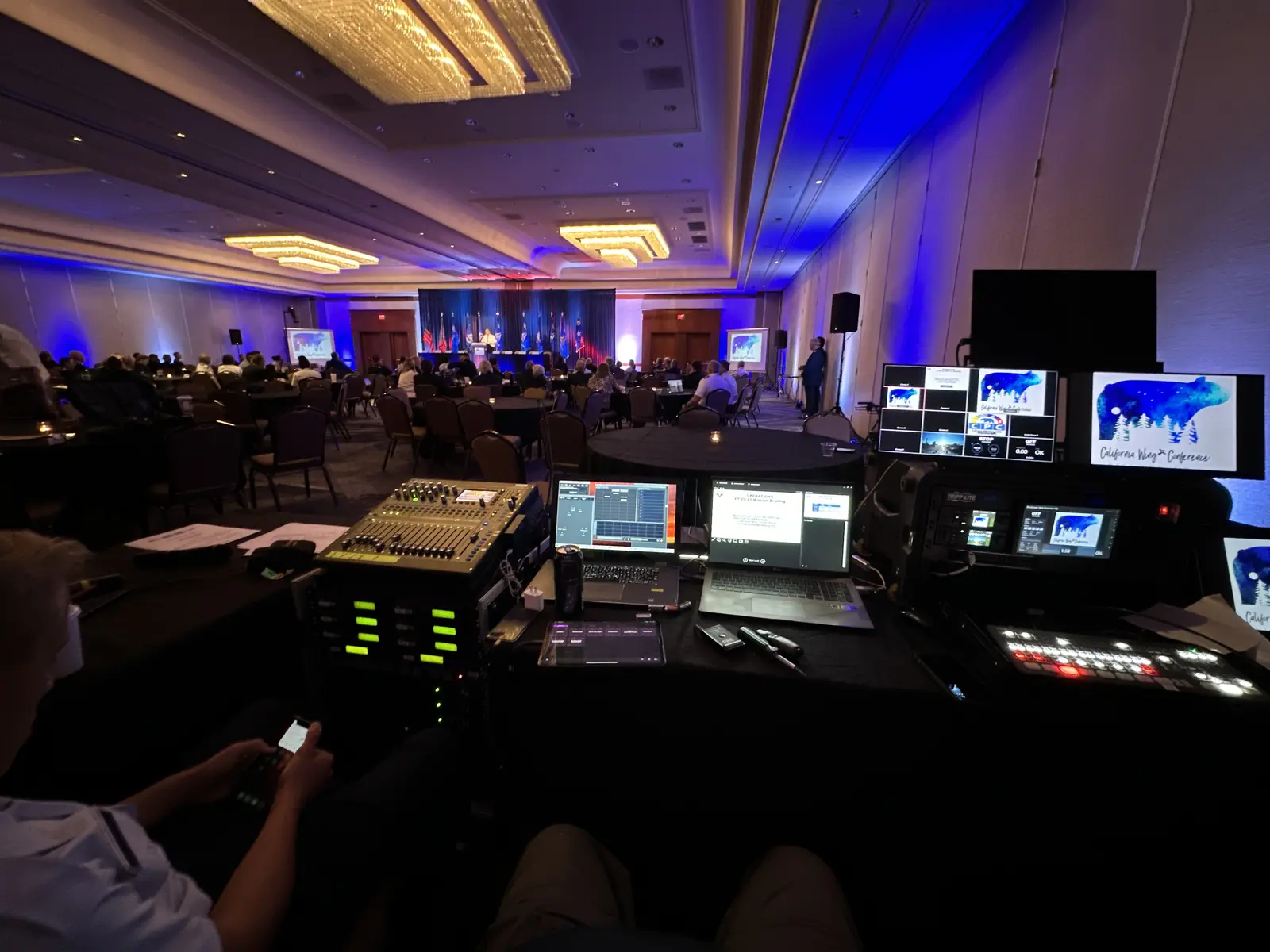 Audiovisual production control station at a conference