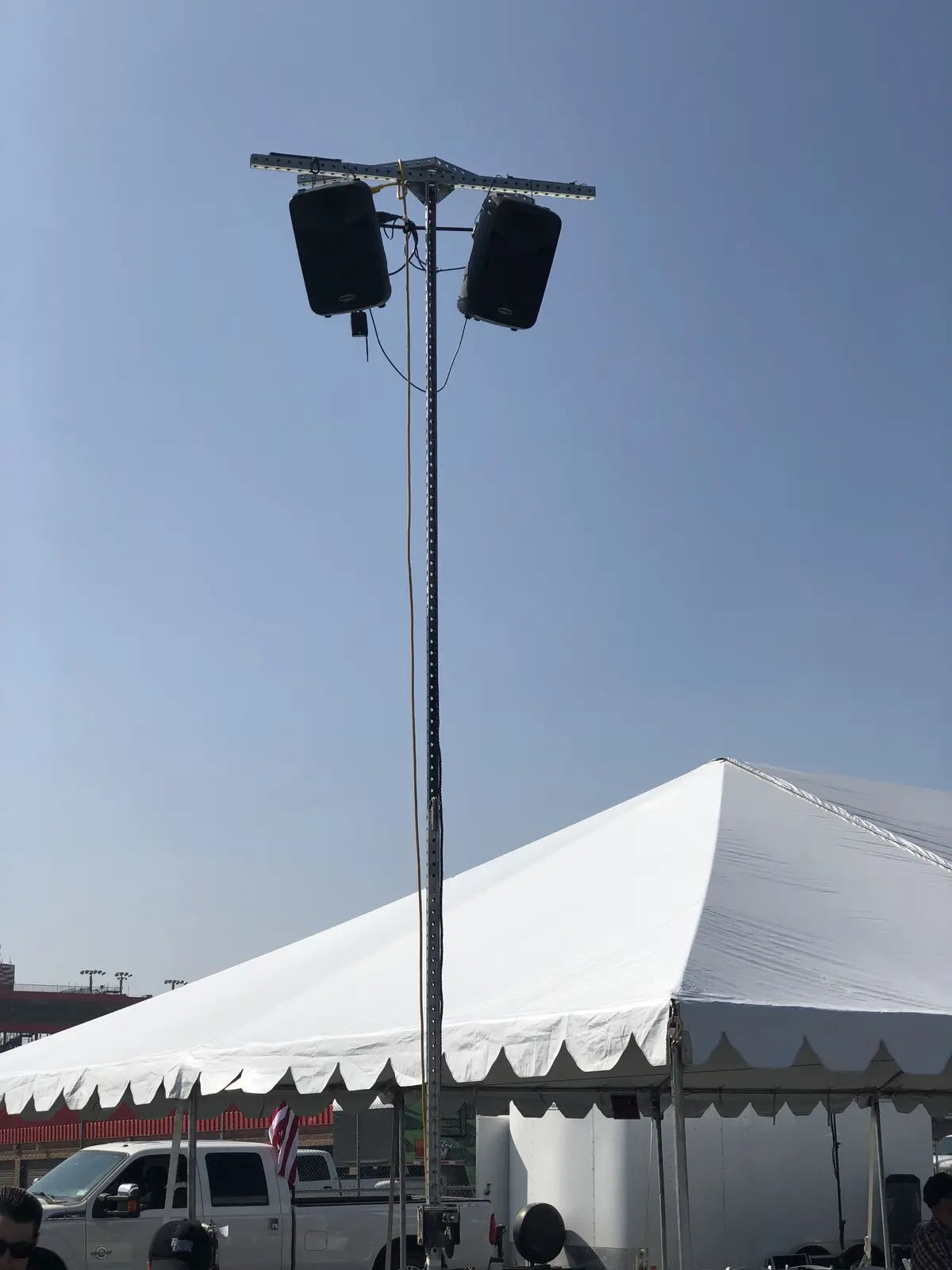 Speakers mounted for an outdoor expo