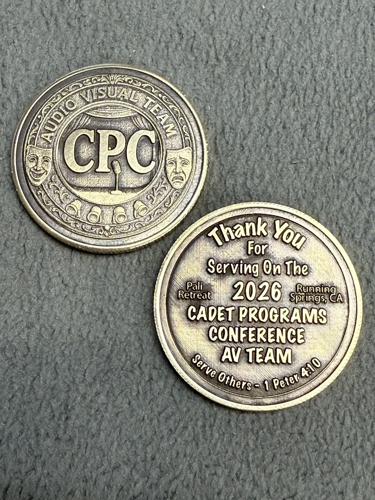 Front and back of custom challenge coins