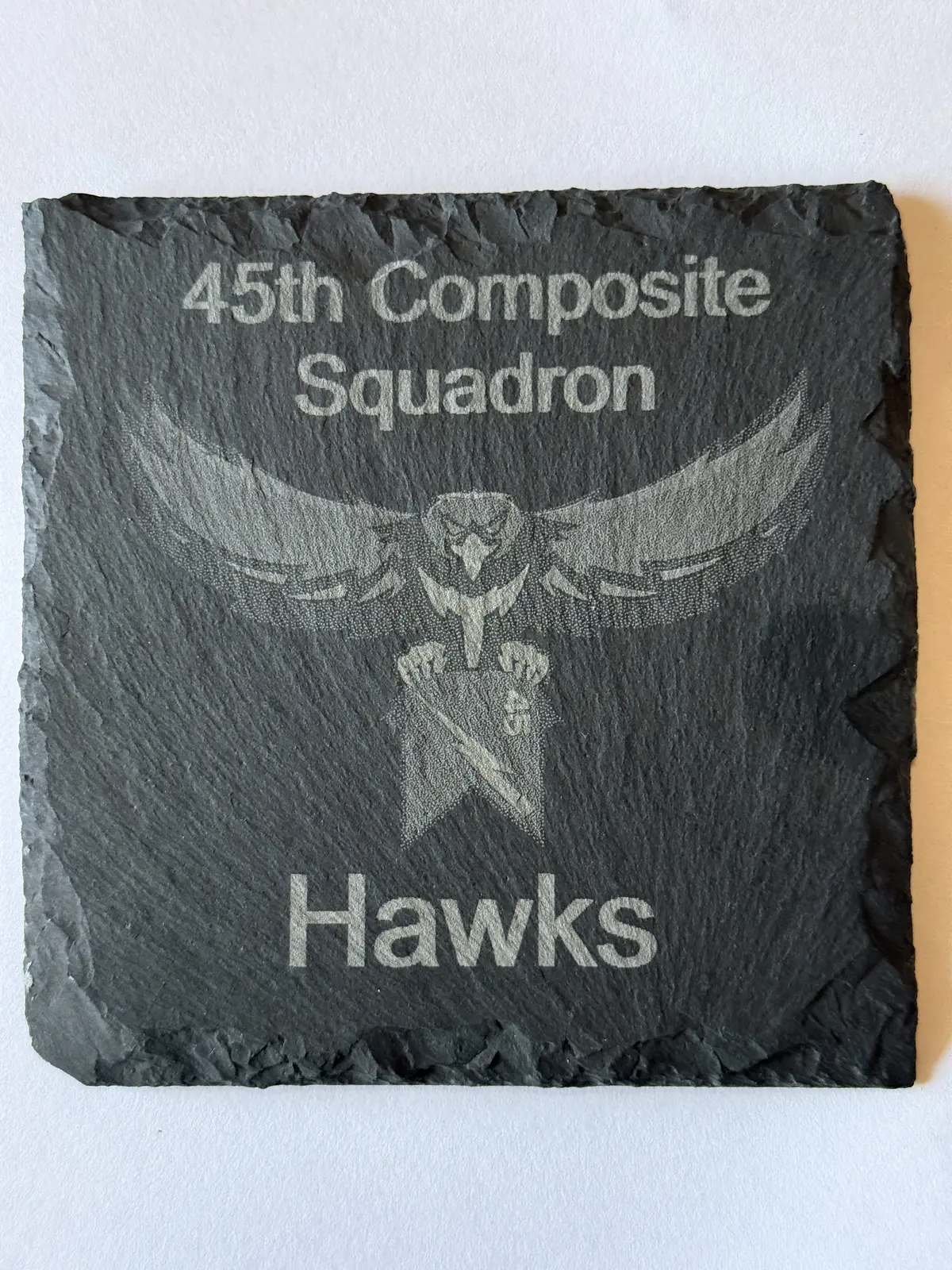 Square slate coaster with squadron emblem