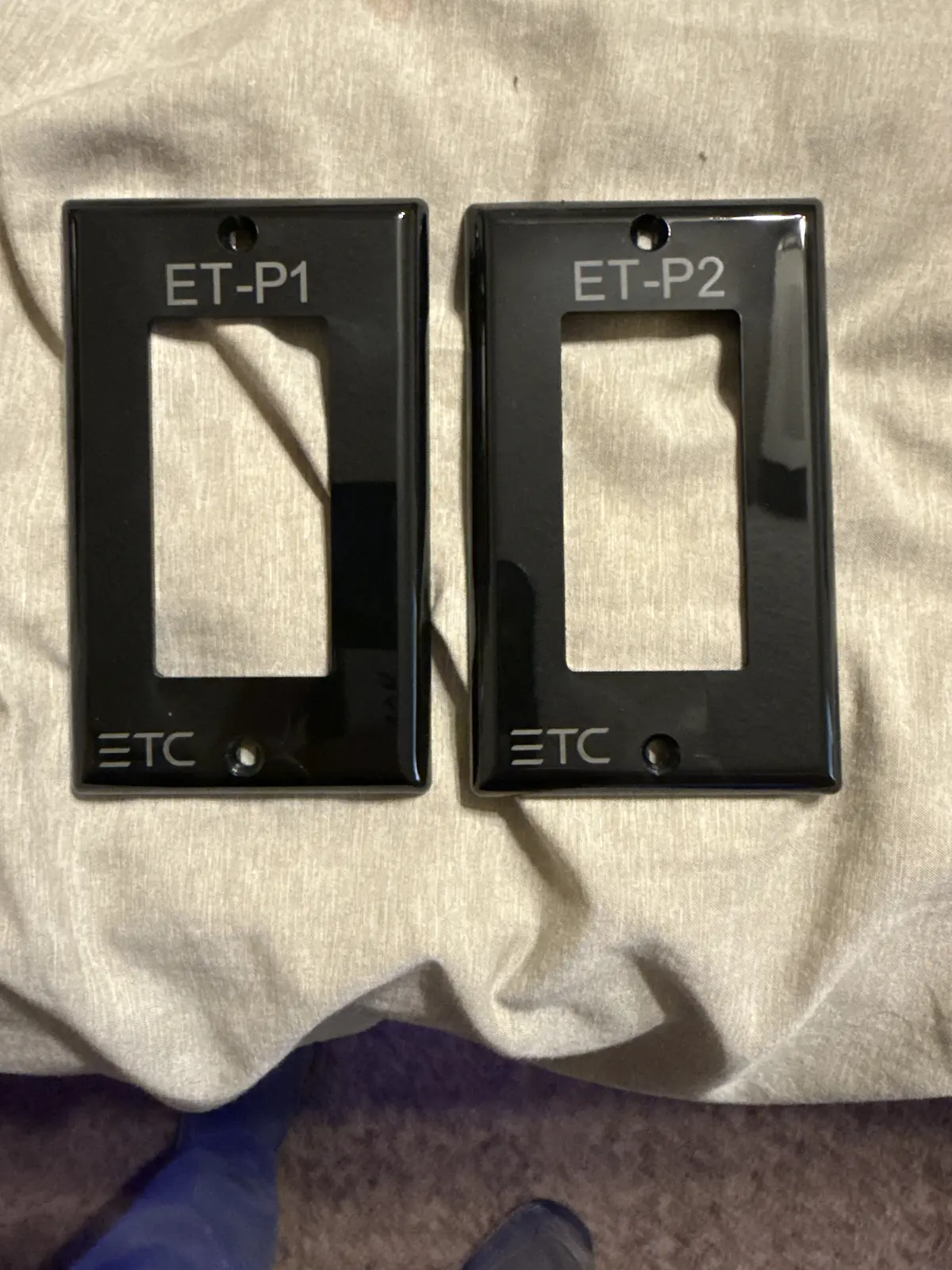 Two engraved switch plates