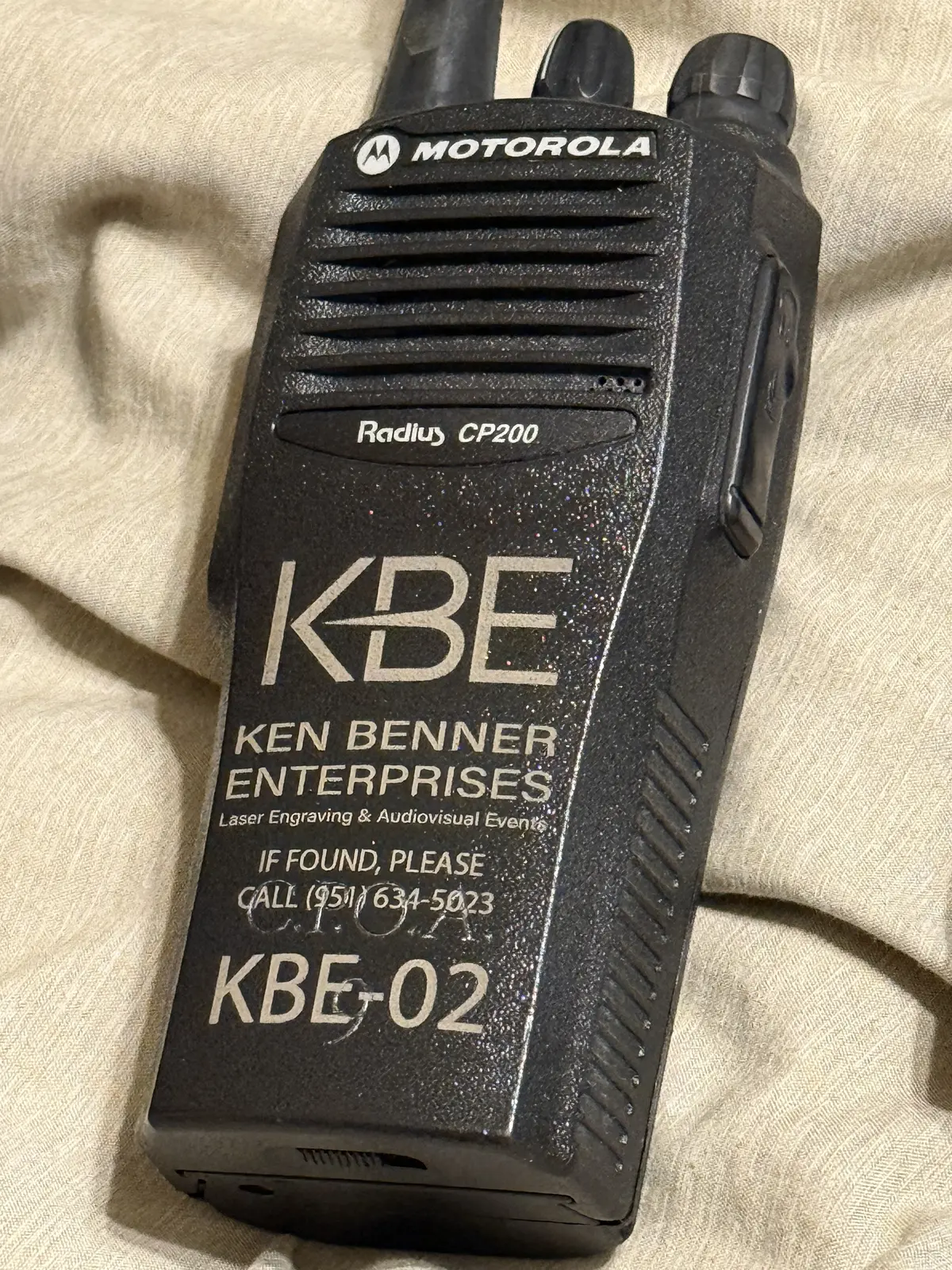 Radio engraved with company identification