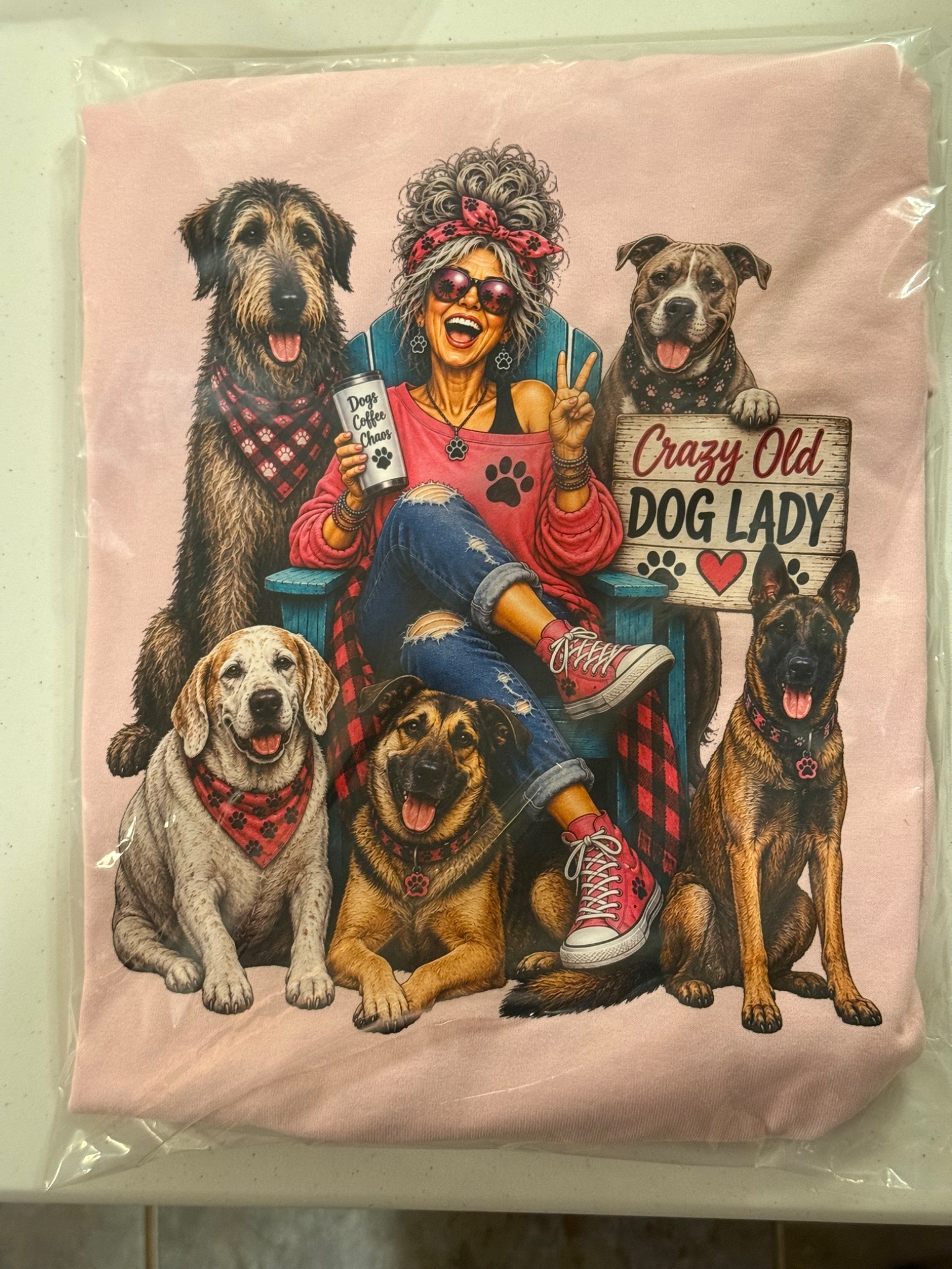 Pink shirt with Crazy Old Dog Lady artwork and five dogs