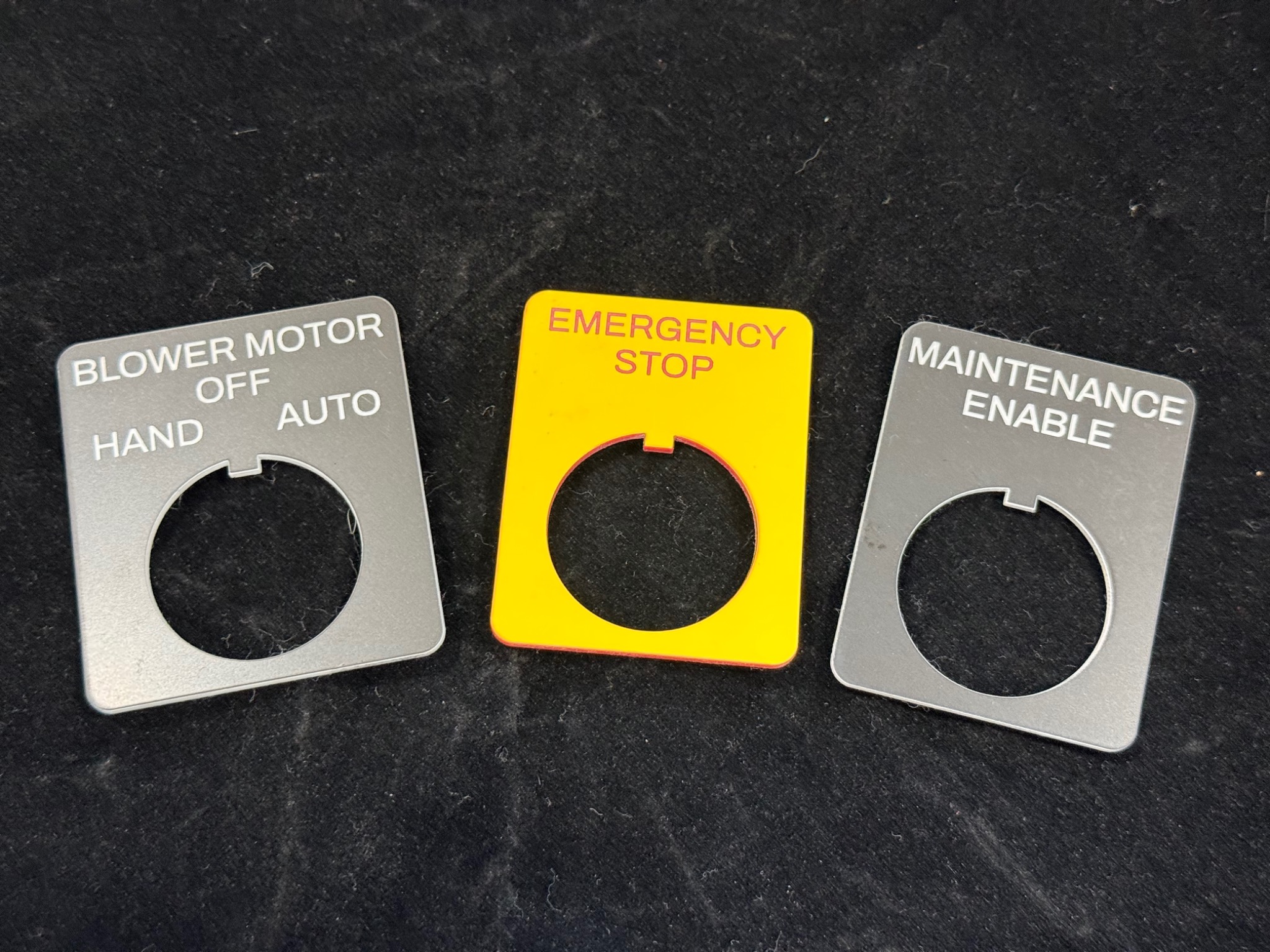 Custom engraved blower motor, emergency stop, and maintenance enable control labels